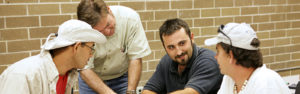 A group of adult education students studying together.