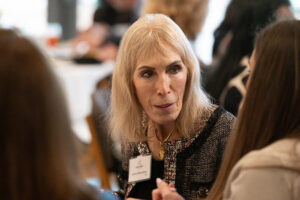 Attendees engaged in conversation during the Literacy Matters wine reception