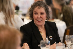 Attendees engaged in conversation during the Literacy Matters wine reception