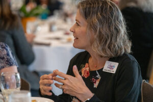 Attendees engaged in conversation during the Literacy Matters wine reception