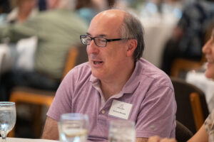 Attendees engaged in conversation during the Literacy Matters wine reception