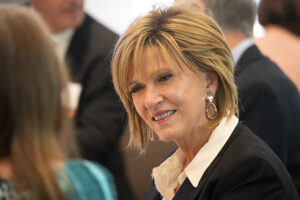 Attendees engaged in conversation during the Literacy Matters wine reception