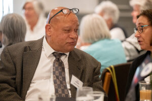 Attendees engaged in conversation during the Literacy Matters wine reception