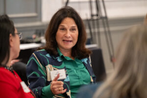Attendees engaged in conversation during the Literacy Matters wine reception