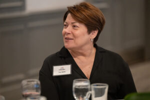 Attendees engaged in conversation during the Literacy Matters wine reception