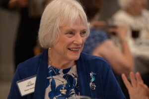 Attendees engaged in conversation during the Literacy Matters wine reception