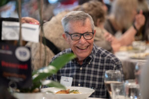 Attendees engaged in conversation during the Literacy Matters wine reception