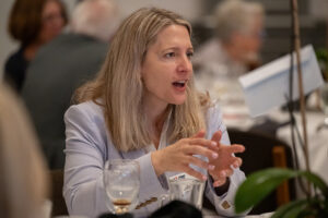 Attendees engaged in conversation during the Literacy Matters wine reception