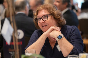 Attendees engaged in conversation during the Literacy Matters wine reception