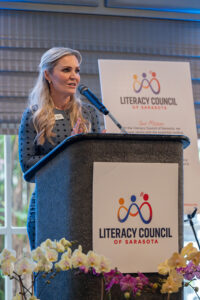 Guest speaker Jessica Muroff addressing attendees from the stage at the Literacy Matters 2026 Luncheon.
