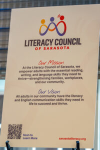 Audience members applauding during an awards presentation at the Literacy Matters 2026 Luncheon.